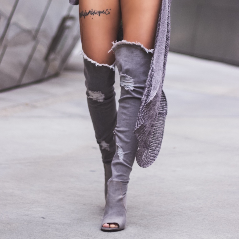 Over the knee distressed jeans boots